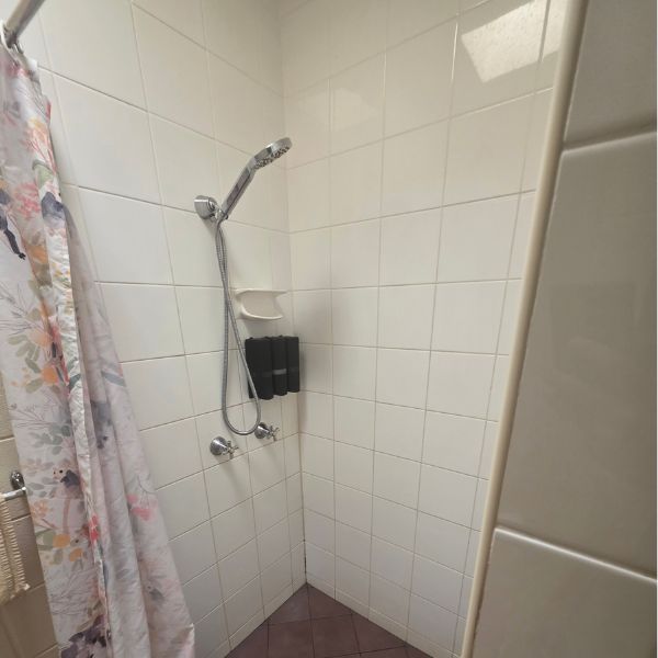 Family Room Shower Bathroom A & A Motel And Lodge